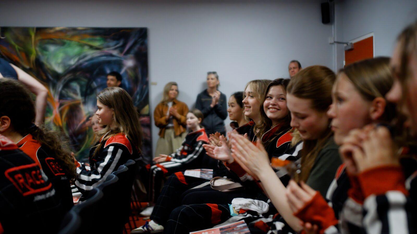 Girls cheering and clapping